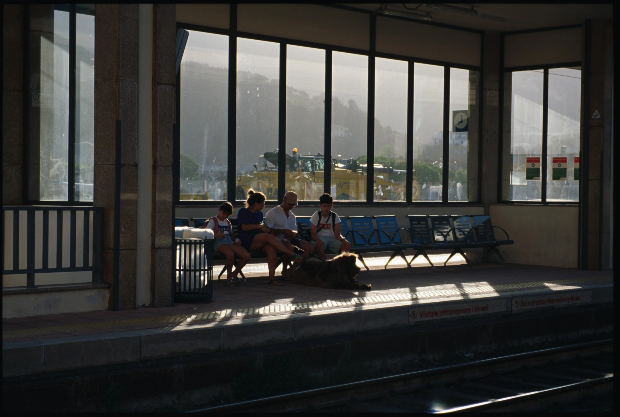 Kodak E100 film scan at a Ligurian railway station in late sunlight