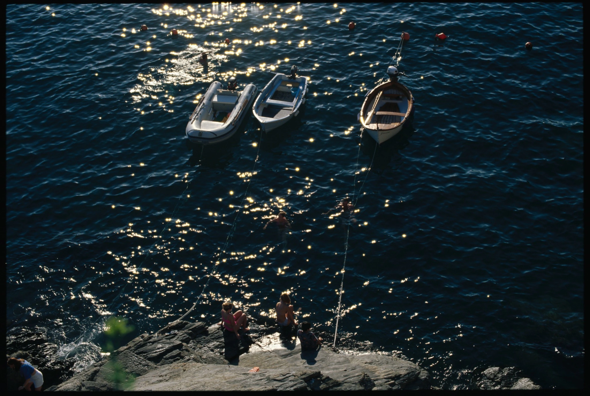 Kodak E100 wet-mounted drum scan showing sunlight reflections on deep blue water